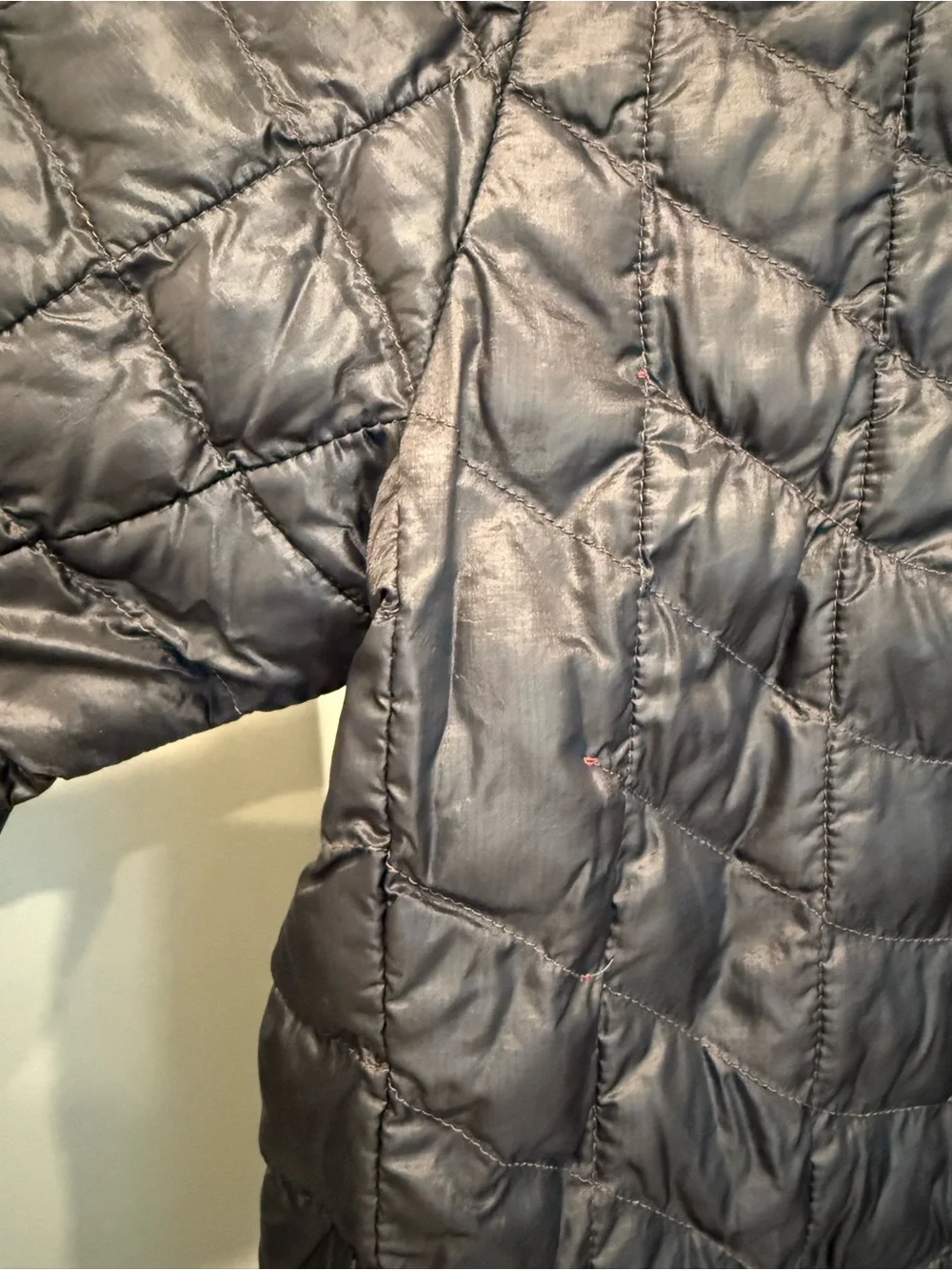 The North Face Men's Black ThermoBall Quilted Insulated Puffer with Red Accents